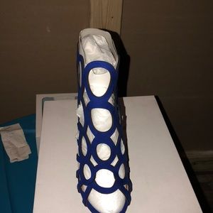 High heels cobalt blue. Never worn.